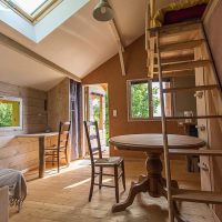 L'intérieur de la petite cabane de la prairie Cabane de la prairie à louer Vercors