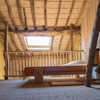 La grande mezzanine avec un lit double et deux lits simples Gîte 7-9 places Entre Ciel et Pierres Vercors