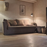 Le coin salon avec son poêle à bois Gîte 4 places à louer Vercors