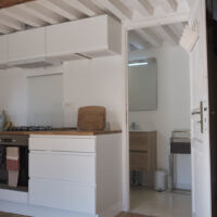 Cuisine et entrée dans la salle de bain Gîte 4 places à louer Vercors