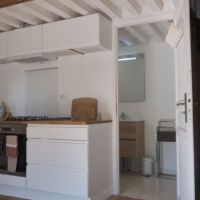 Cuisine et entrée dans la salle de bain Gîte 4 places à louer Vercors